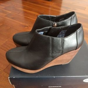 Black wedge booties with zipper
